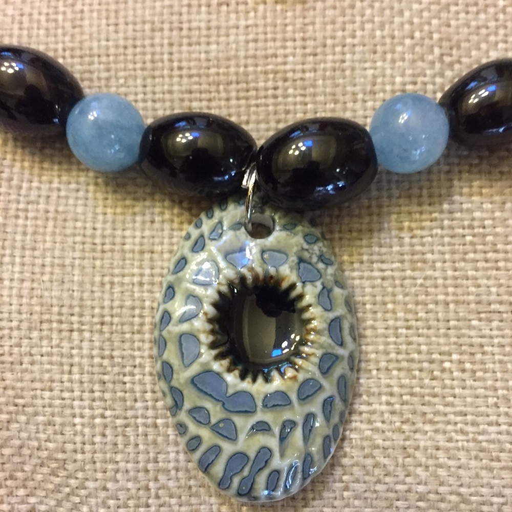 Handmade statement necklace. Porcelain pendant.
